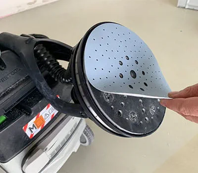 Lägga på passande slippapper