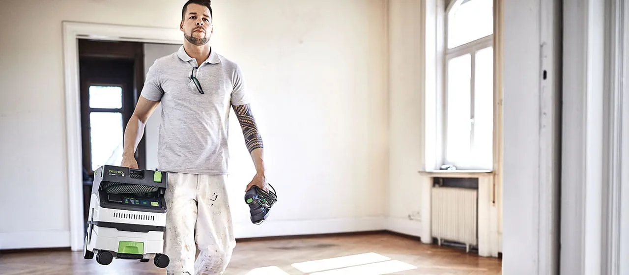 Dammsugare från Festool i arbete på bygget